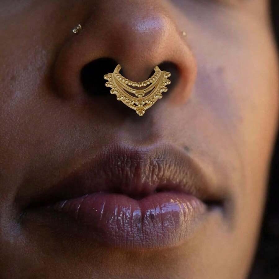 złoty kolczyk septum