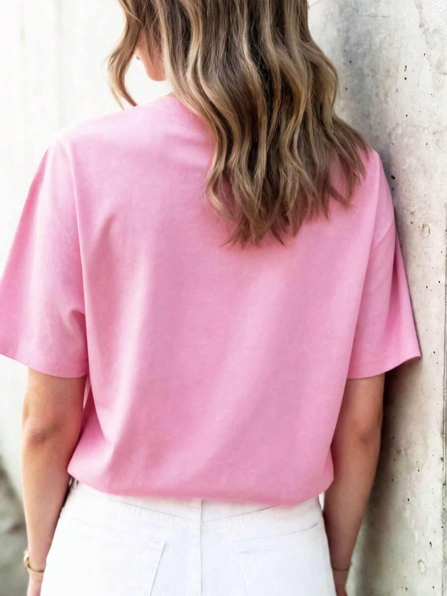 różowy t-shirt napis
