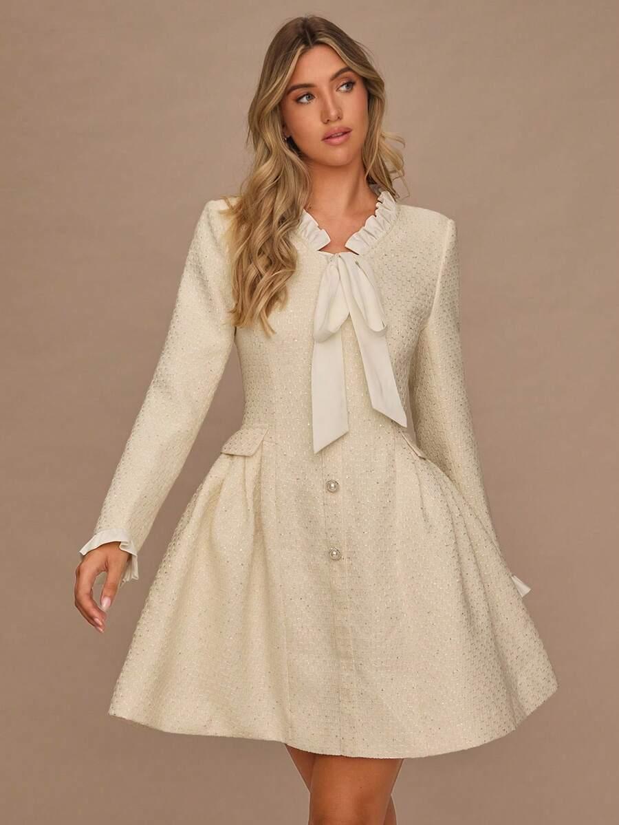 ELEGANCKA KOKTAJLOWA SUKIENKA MINI Z KOKARDĄ 