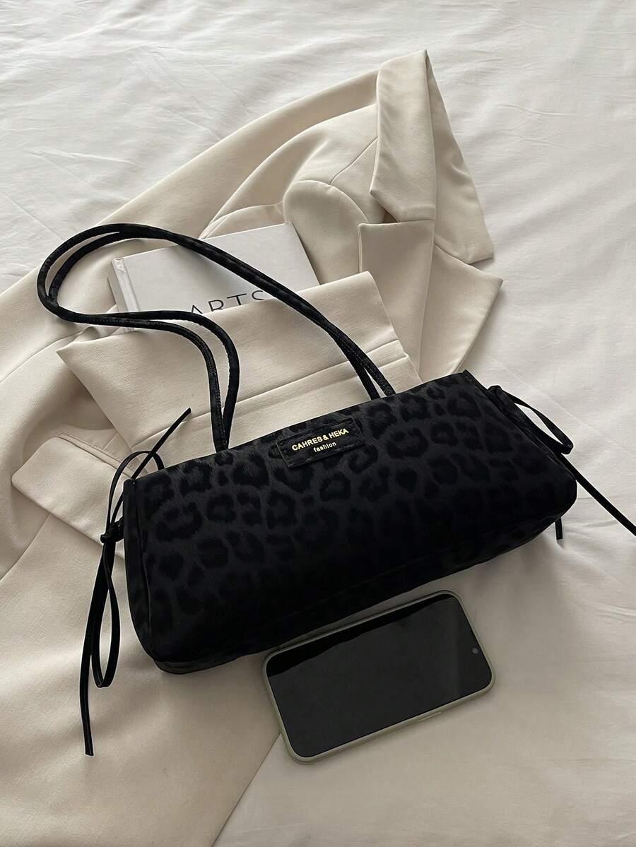 czarna torebka animal print