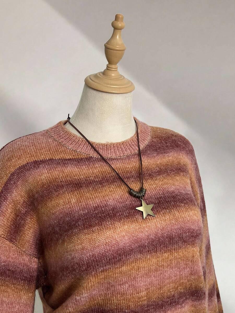 SWETER W PASKI