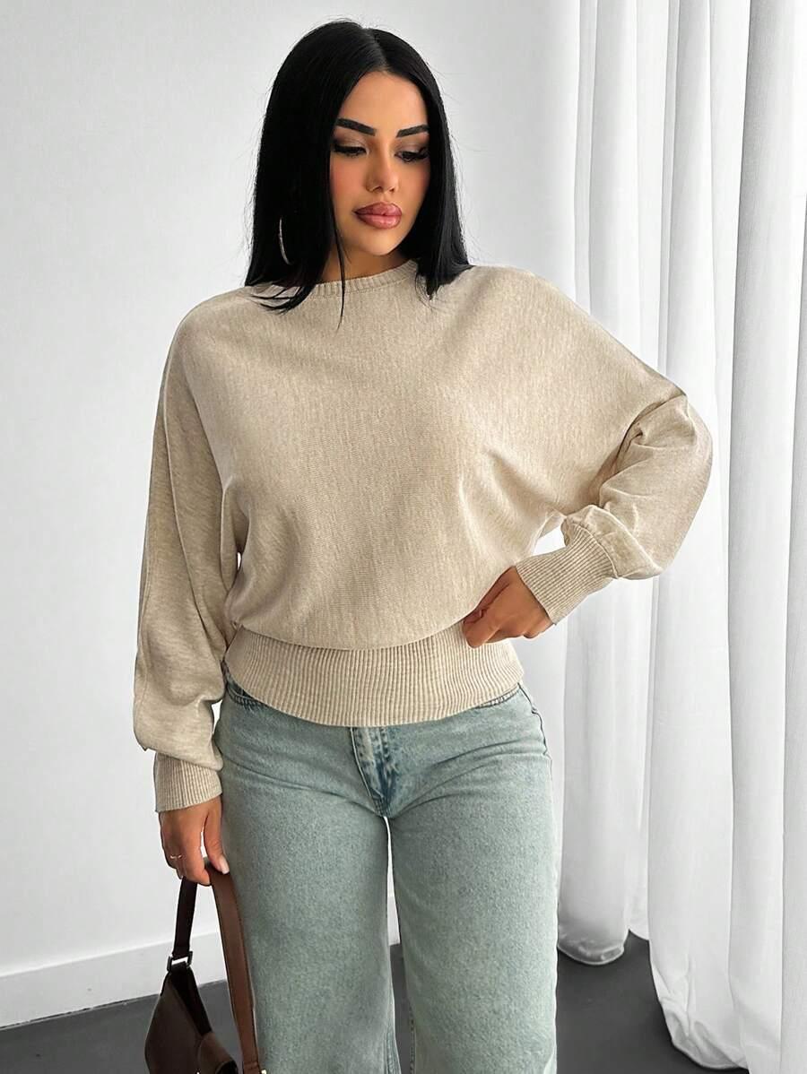 beżowy dzianinowy sweter 