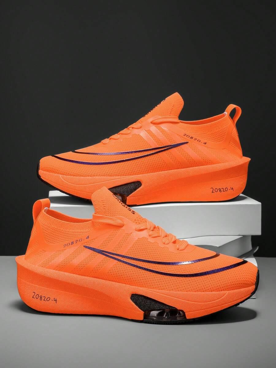 pomarańczowe buty sportowe