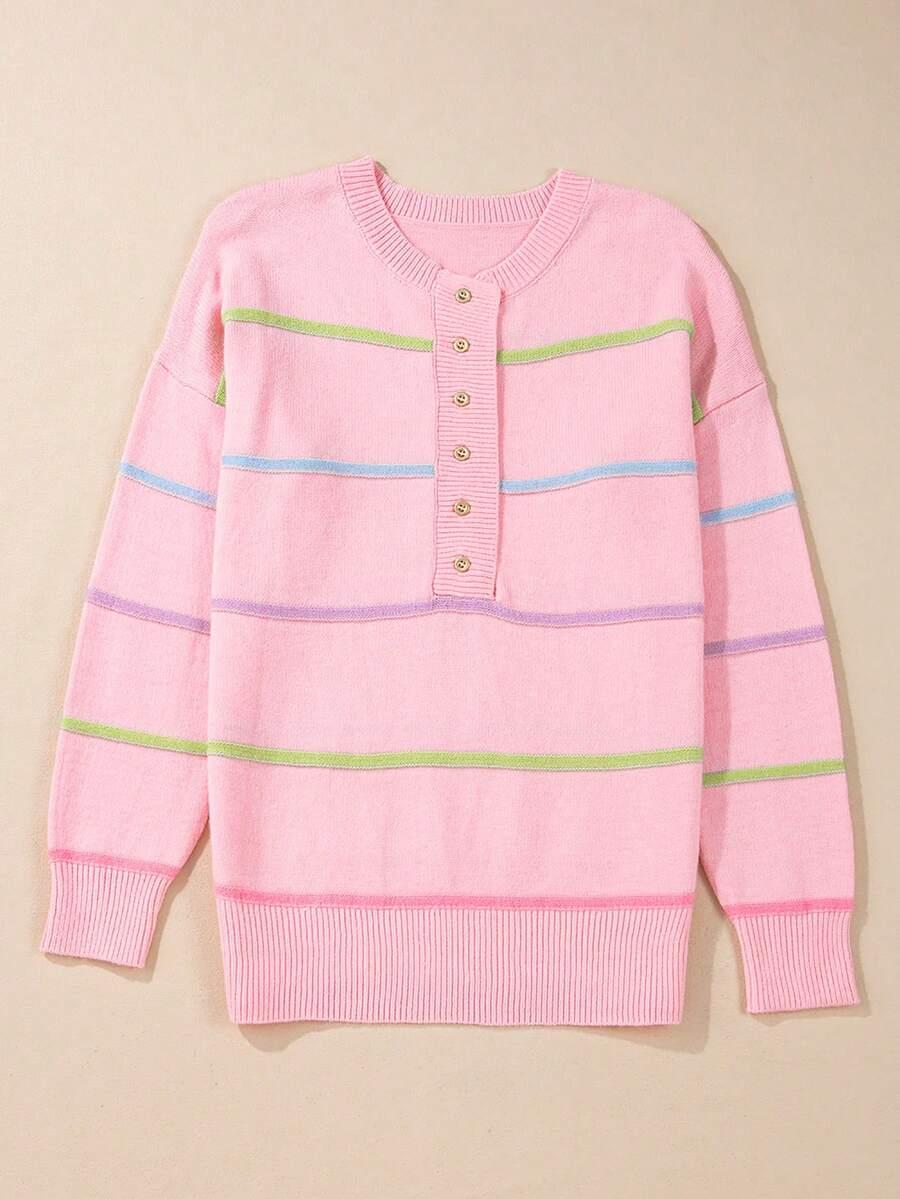 różowy sweter paski