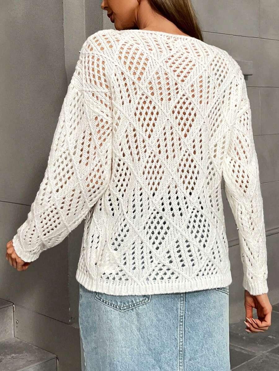 SWETER Z OZDOBNĄ APLIKACJĄ
