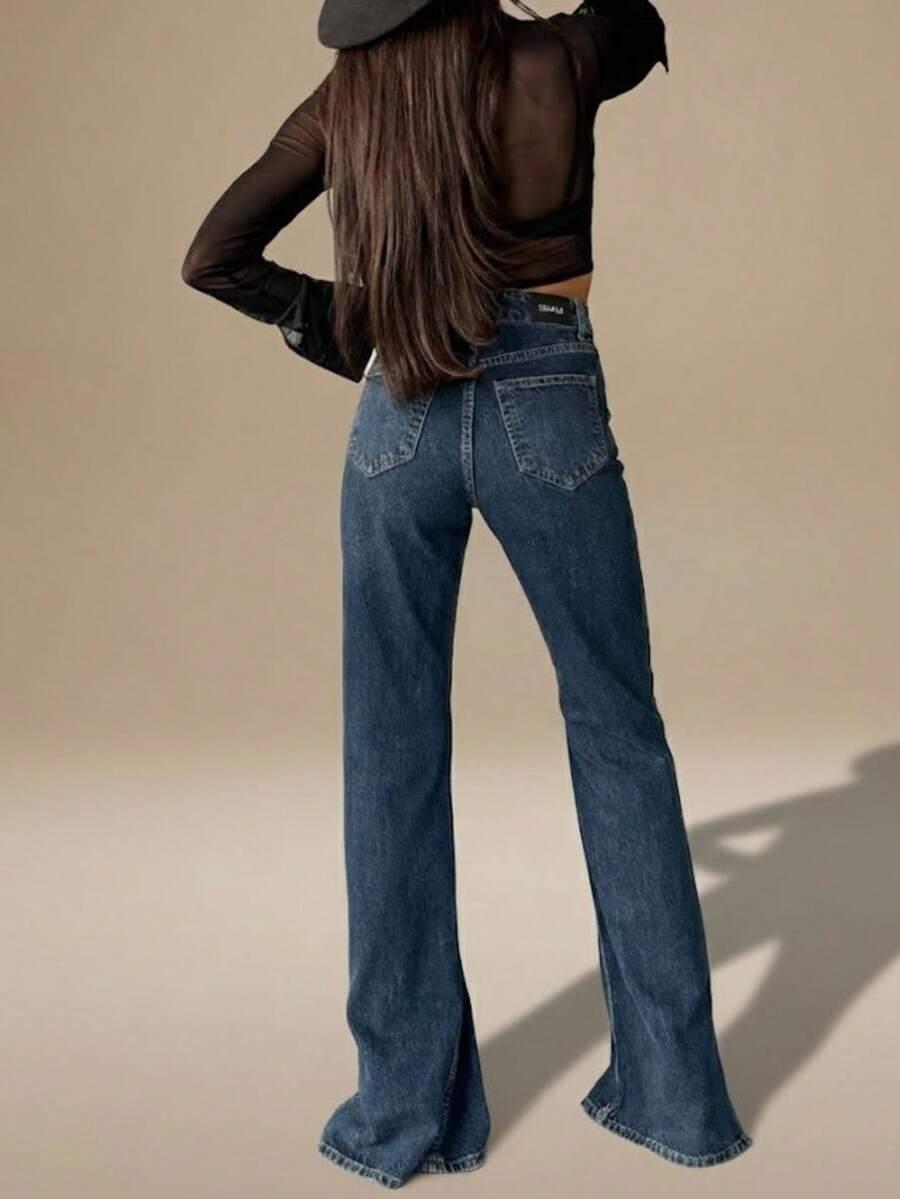 spodnie jeans rozcięcie asymetria