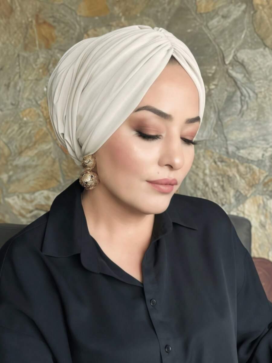 beżowy turban na głowę
