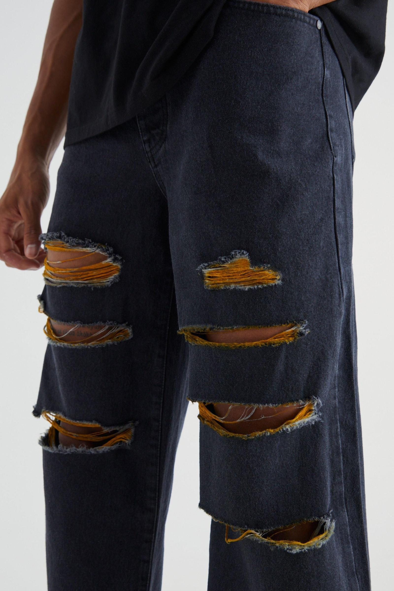 SPODNIE JEANS PRZETARCIA