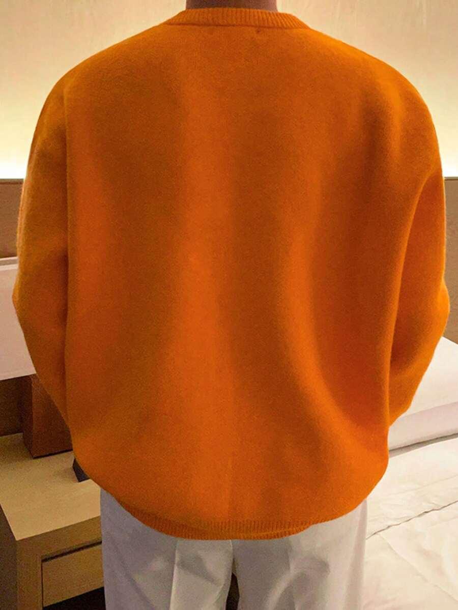 pomarańczowy sweter długi rękaw