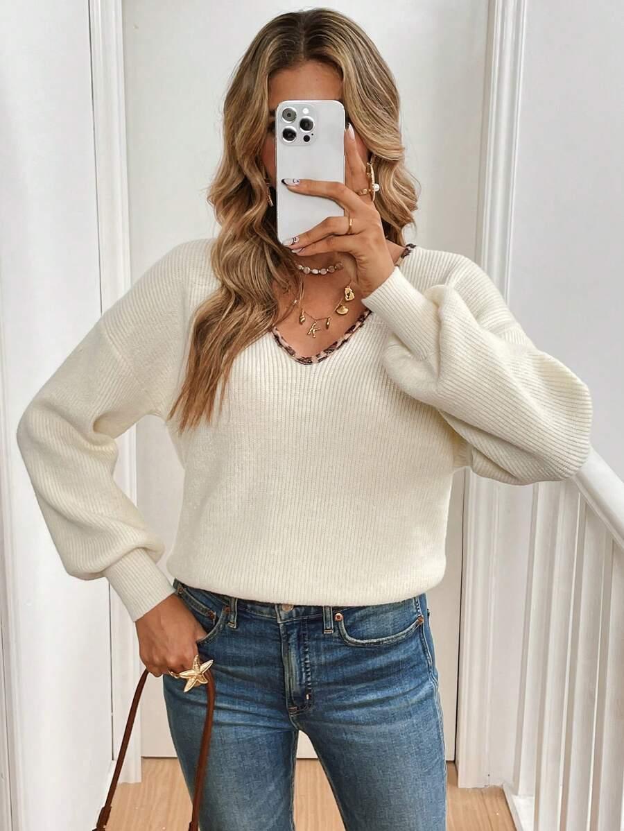 kremowy sweter v-neck