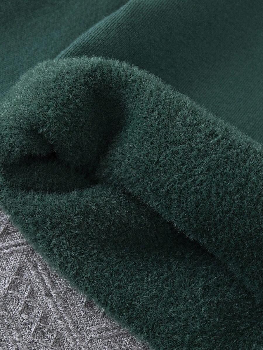 zielony ocieplany sweter