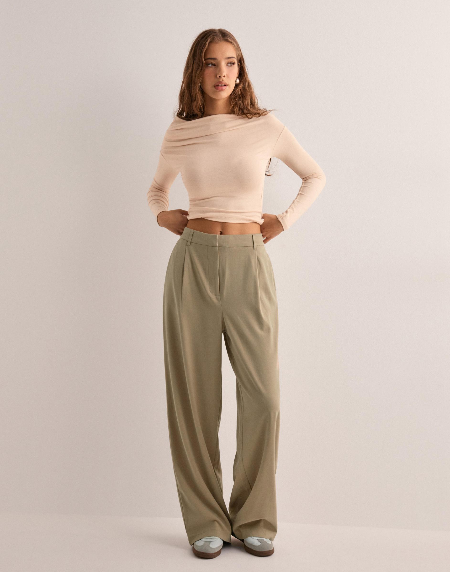 beżowe spodnie baggy kieszenie casual zamek