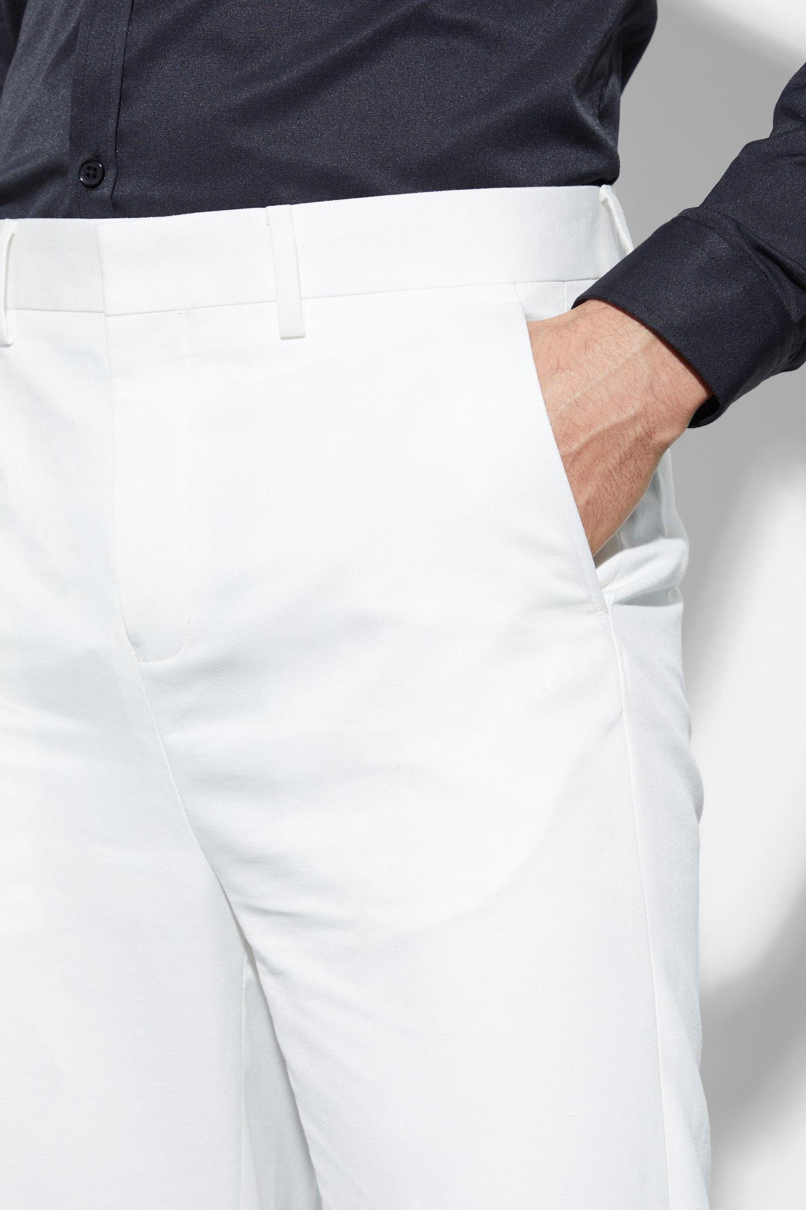 białe eleganckie spodnie