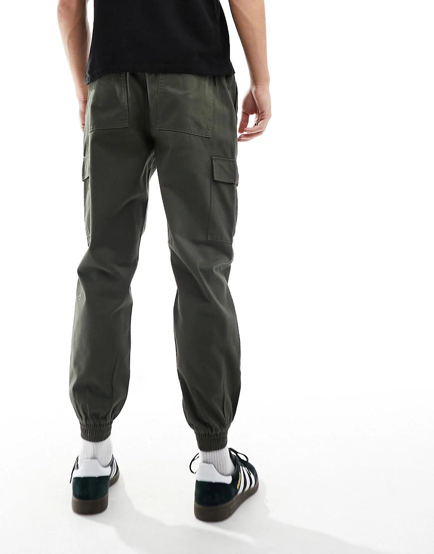 zielone spodnie jogger bojówki kieszenie
