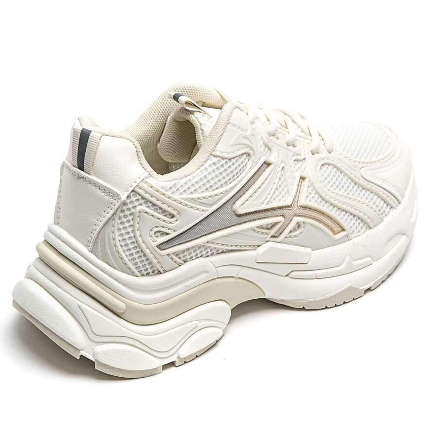 kremowe buty sportowe