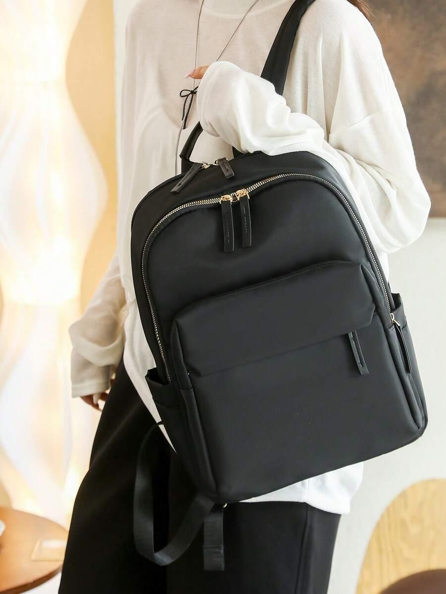 czarny plecak zip