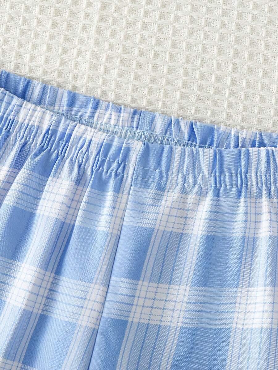 niebieskie spodnie w kratkę