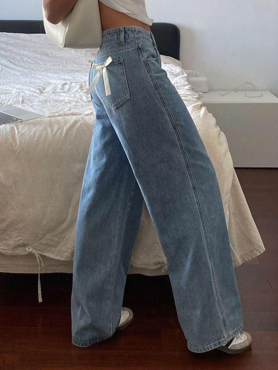 SPODNIE JEANS WYSOKI STAN KOKARDY 