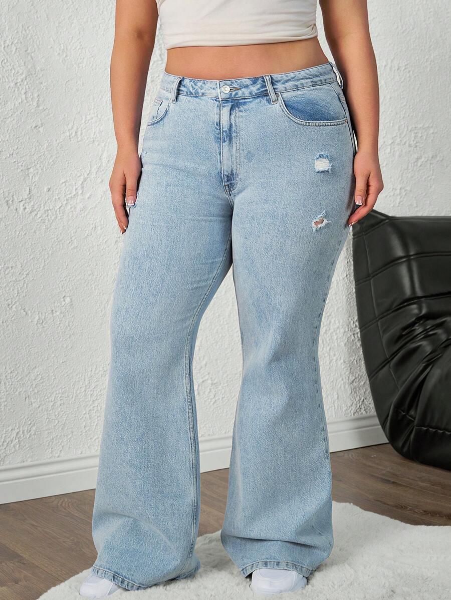 niebieskie spodnie jeans przetarcia 