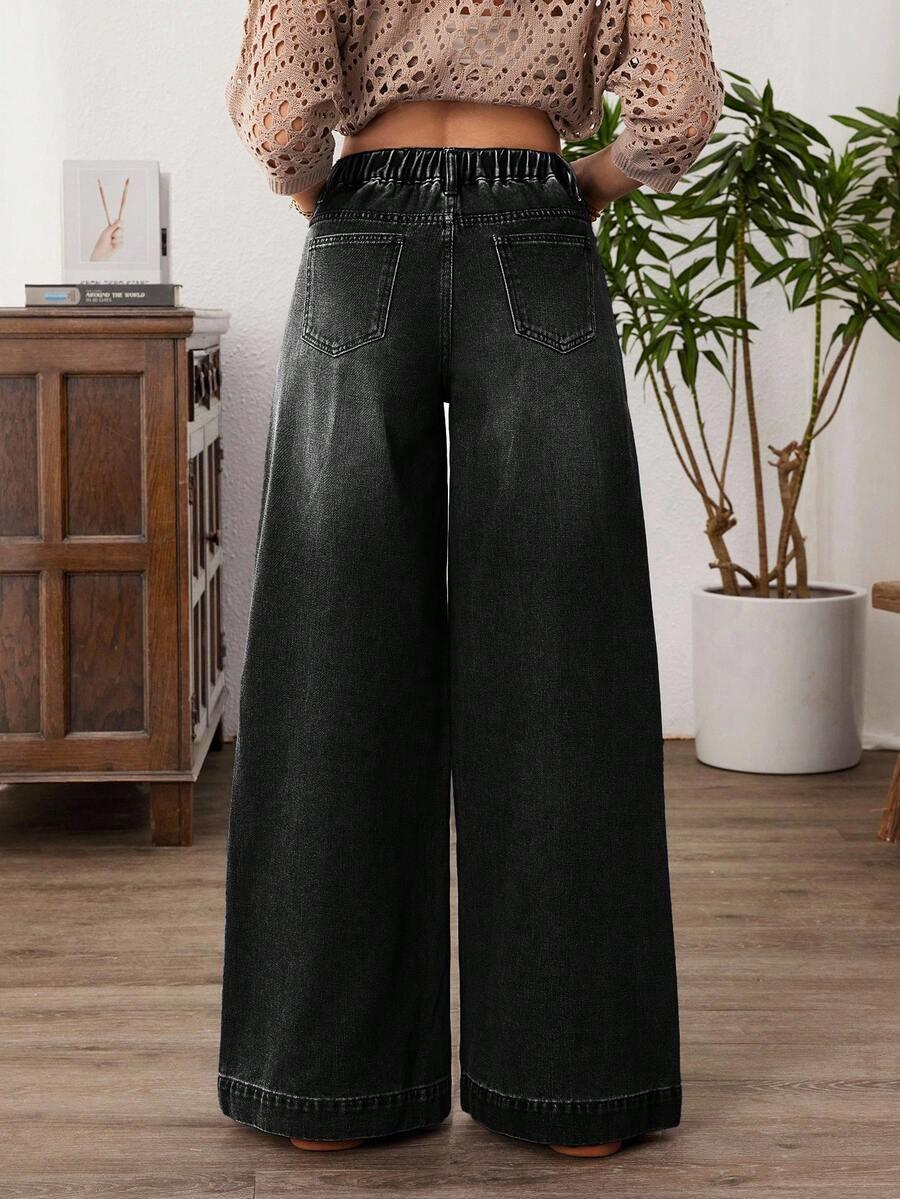 czarne spodnie jeans kieszenie 
