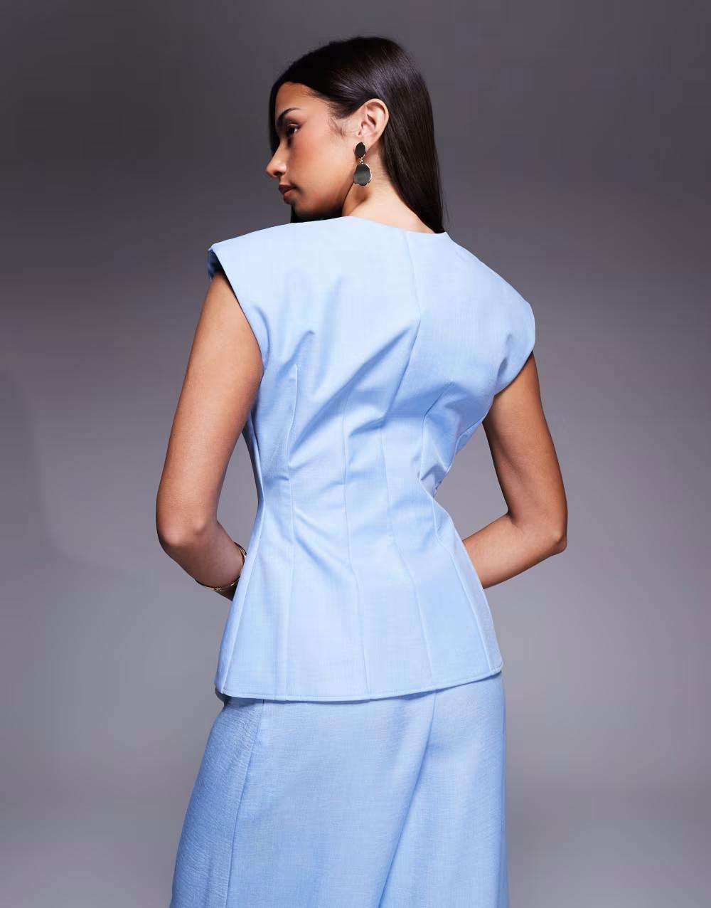 niebieska elegancka kamizelka
