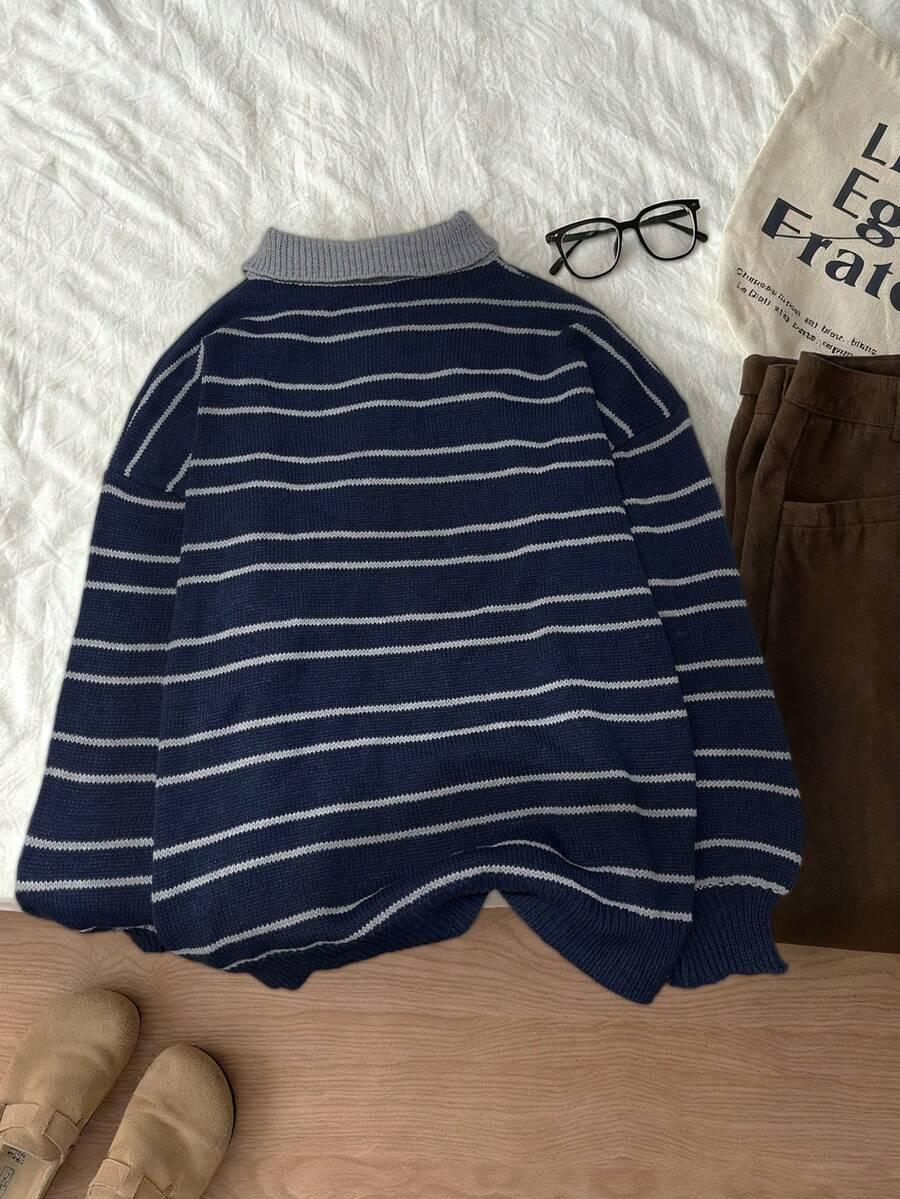 granatowy sweter wzór paski