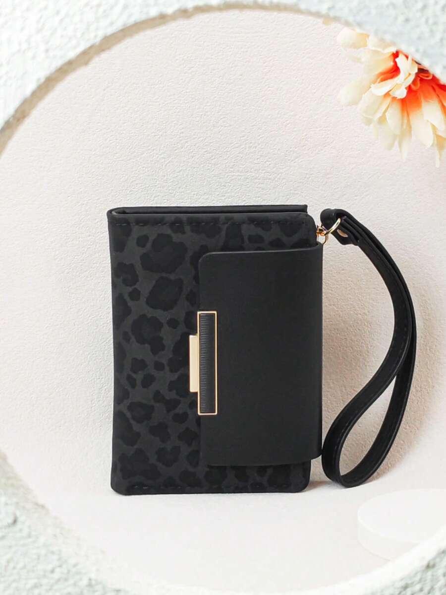 czarny portfel animal print