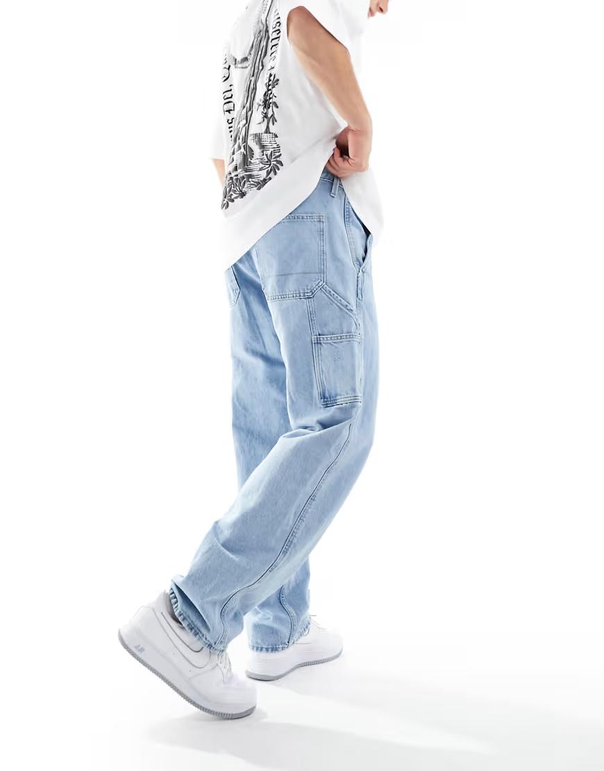 niebieskie spodnie jeans kieszenie