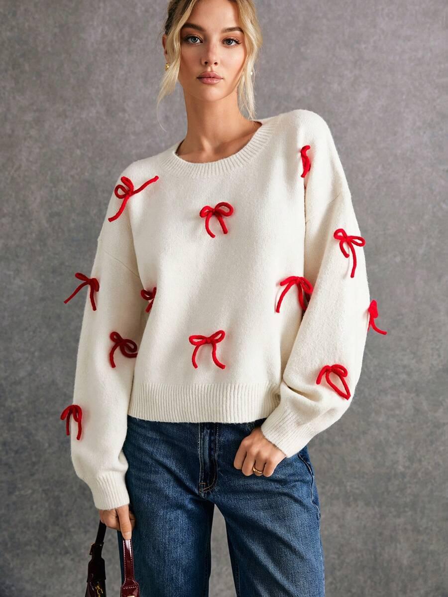 BIAŁY SWETER KOKARDY