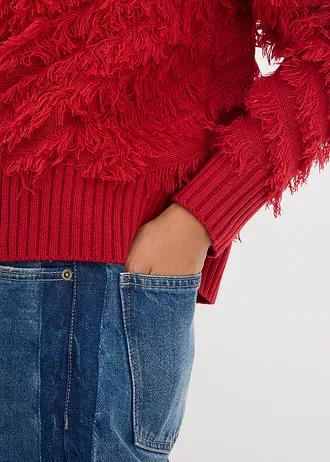 SWETER Z FRĘDZLAMI