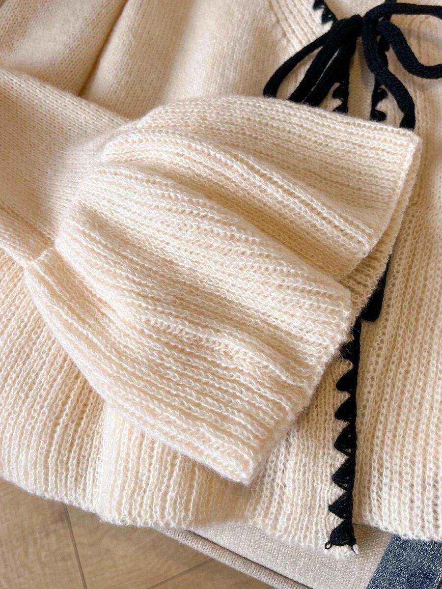 BEŻOWY SWETER WIĄZANIE