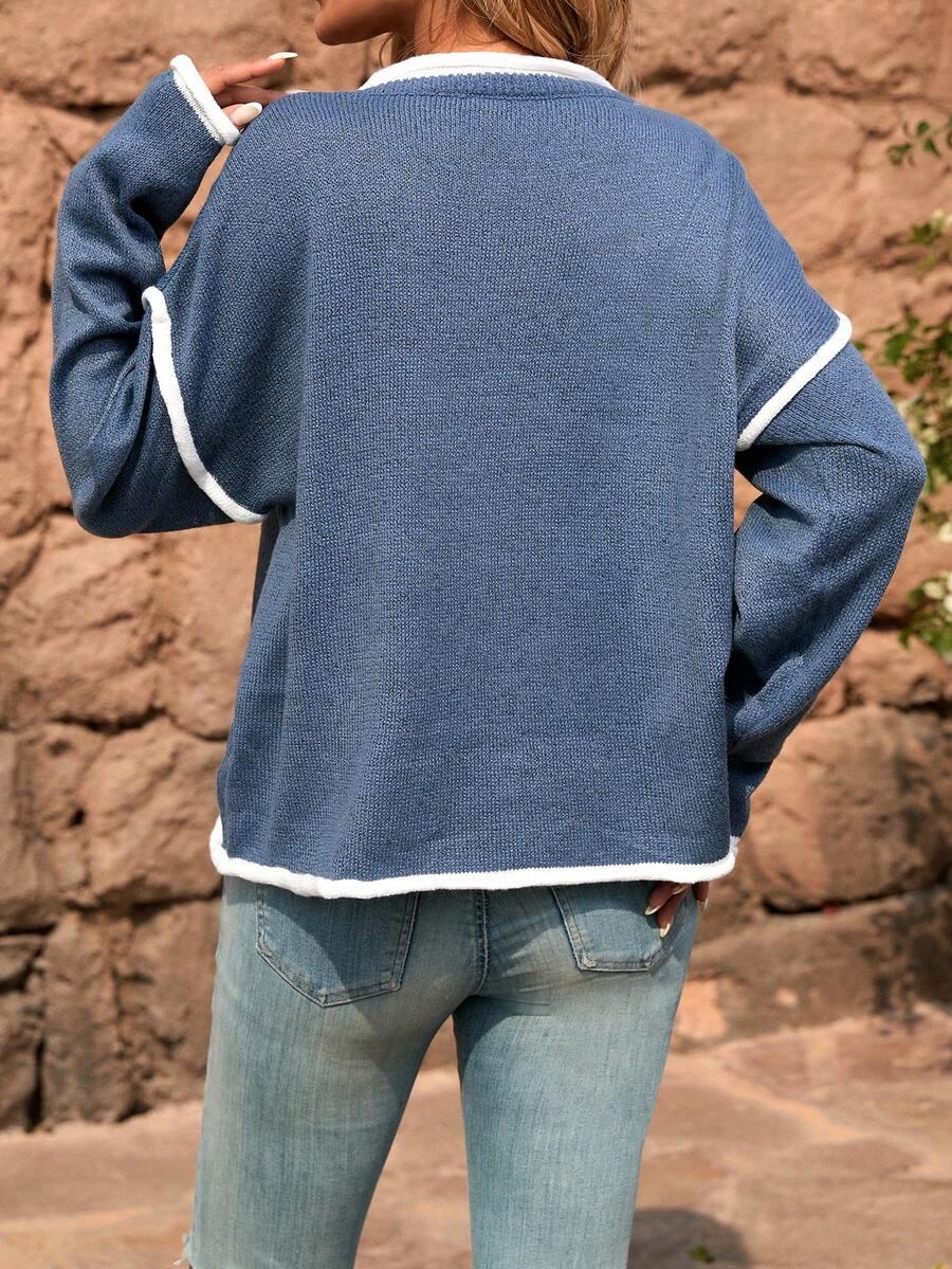 niebieski sweter v-neck