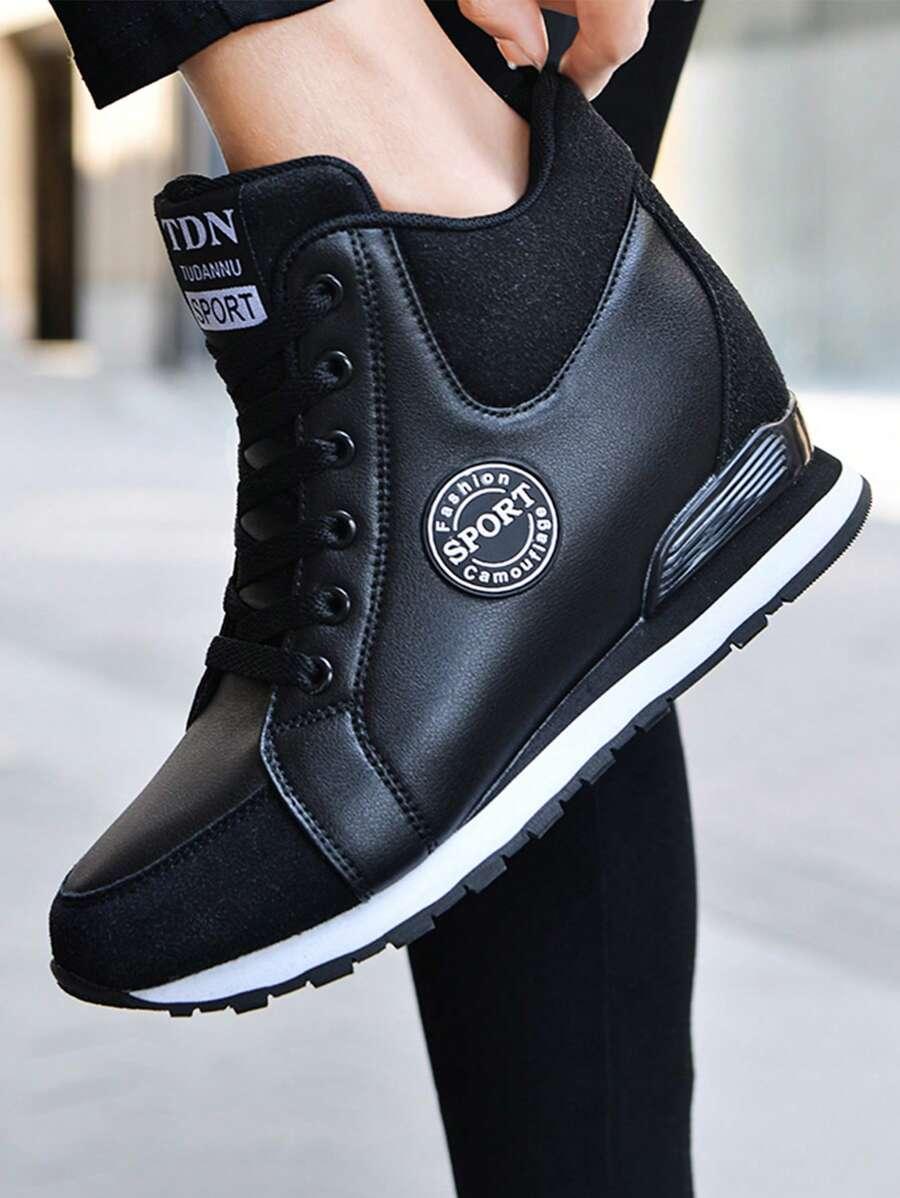 czarne buty sportowe na koturnie