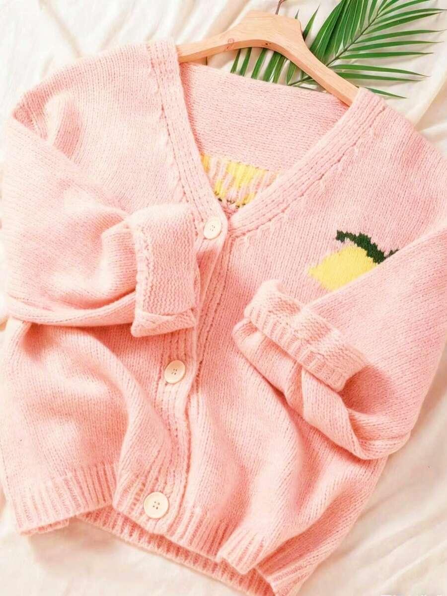 różowy sweter guziki