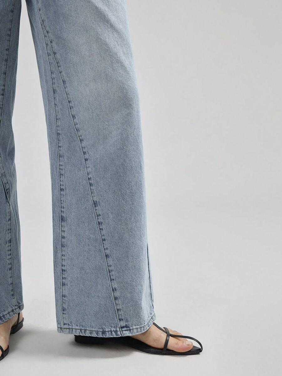SPODNIE JEANS ASYMETRIA