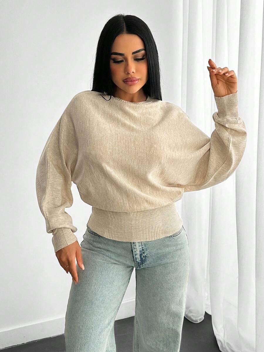 beżowy dzianinowy sweter 