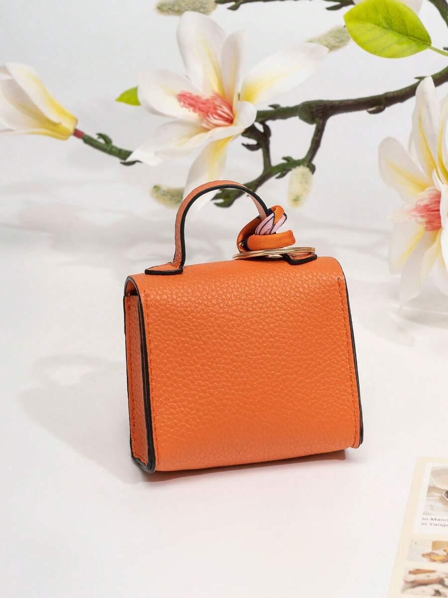 pomarańczowy portfel brelok