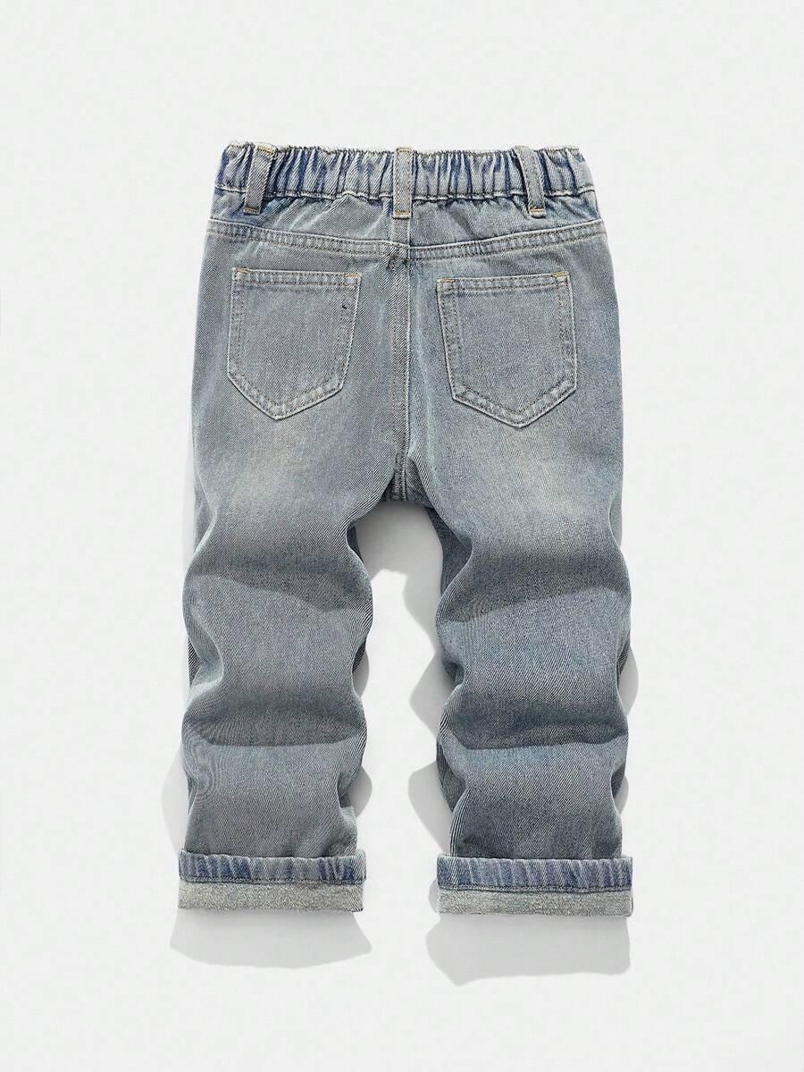 niebieskie spodnie jeans 