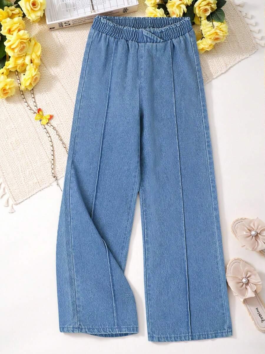 niebieskie spodnie jeans