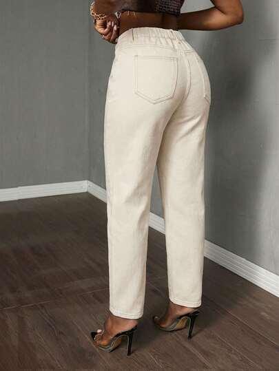 kremowa spodnie jeans