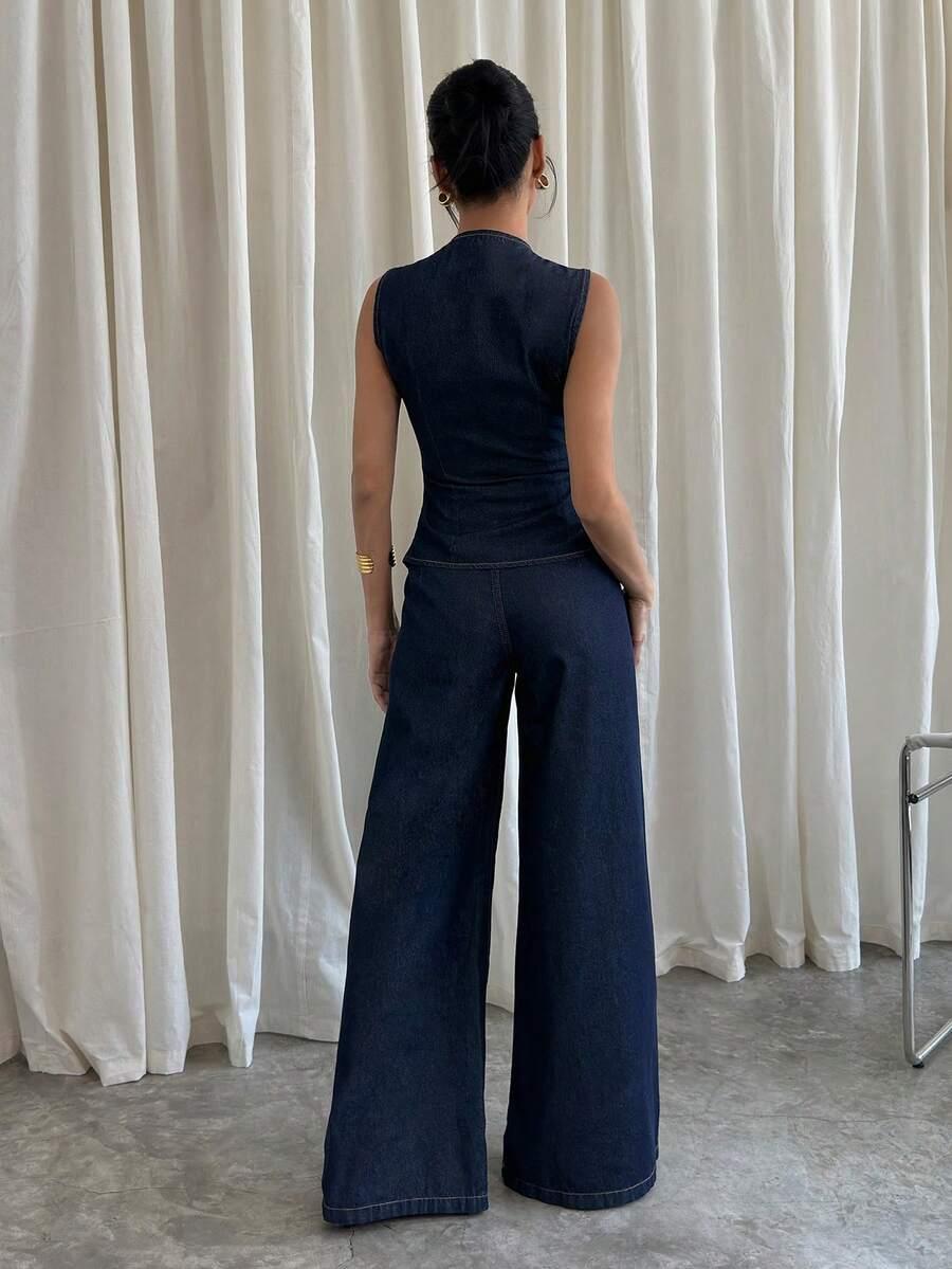 granatowy komplet bluzka spodnie jeans