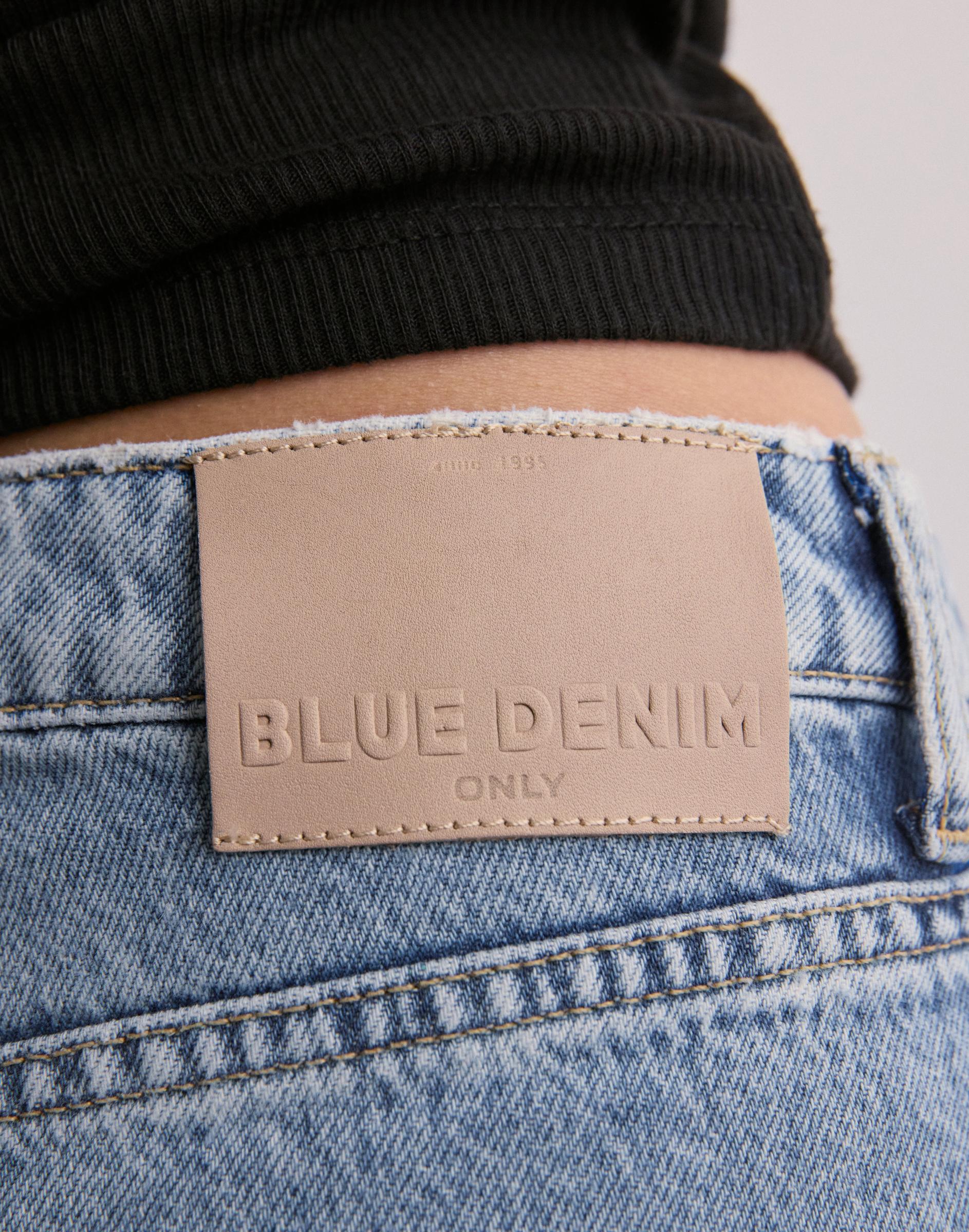 spodnie wide leg jeans kieszenie asymetria guziki