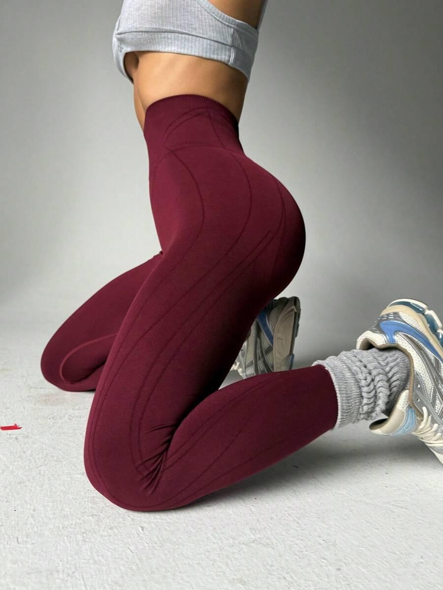 bordowe legginsy sportowe logo