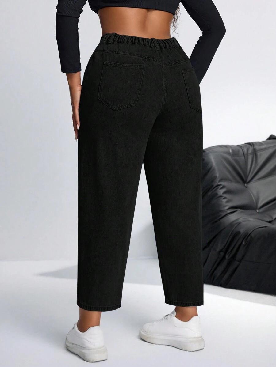 CZARNE SPODNIE JEANS ASYMETRIA
