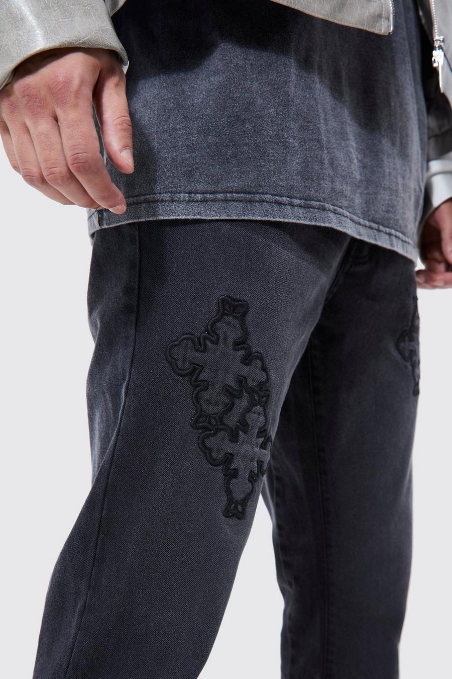 bawełniane czarne spodnie jeans krzyż