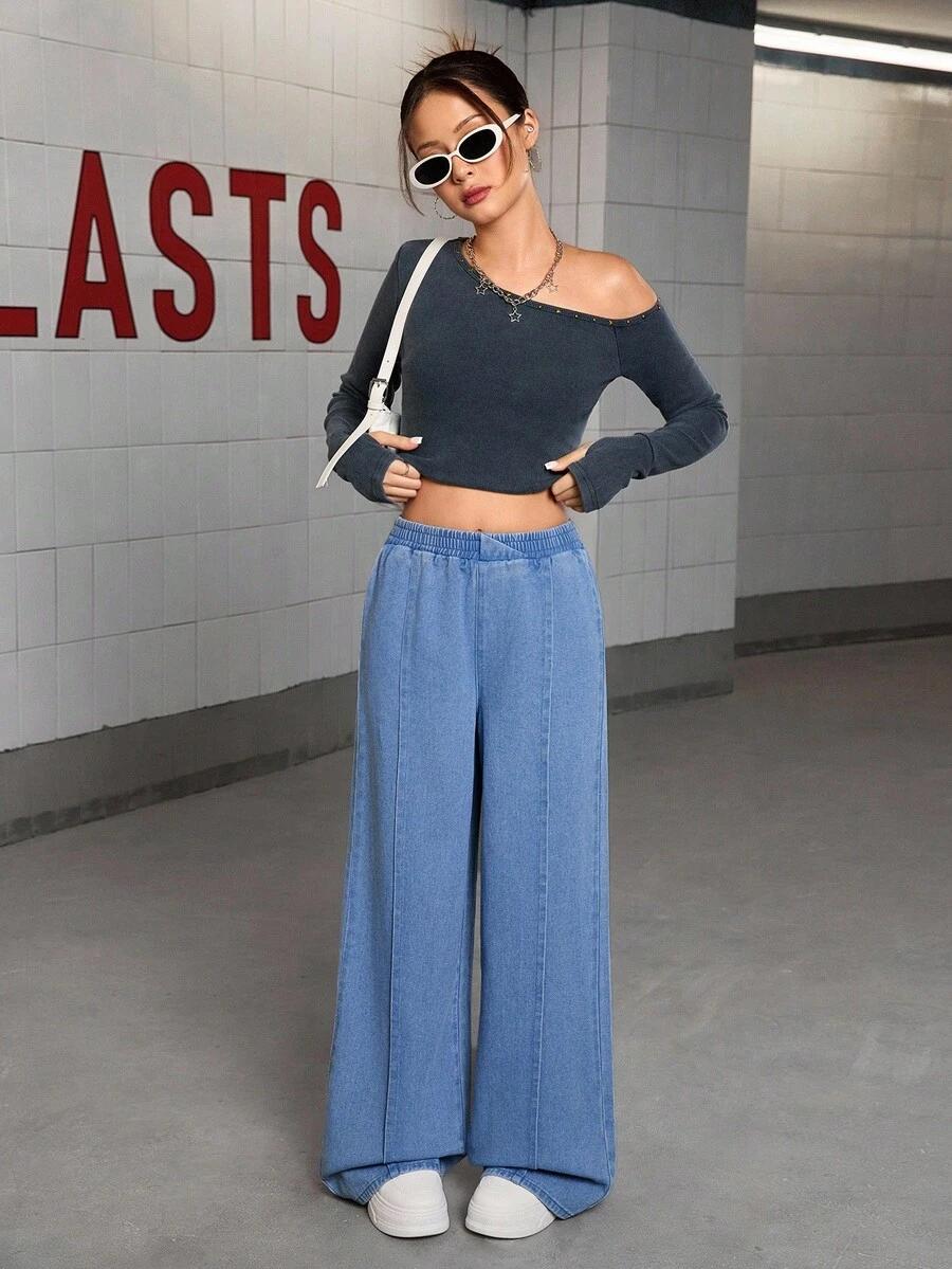niebieskie spodnie jeans