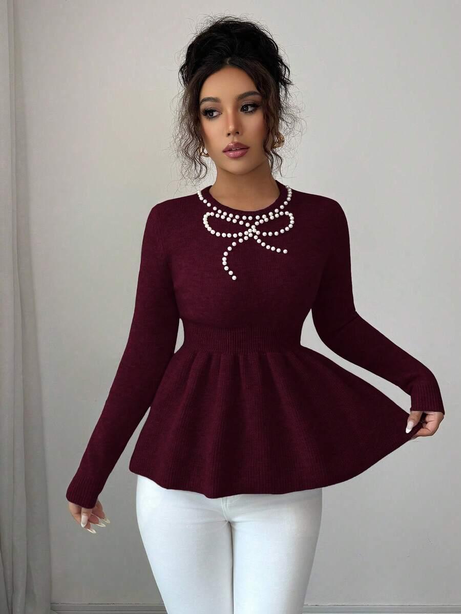 bordowy sweter zdobienie