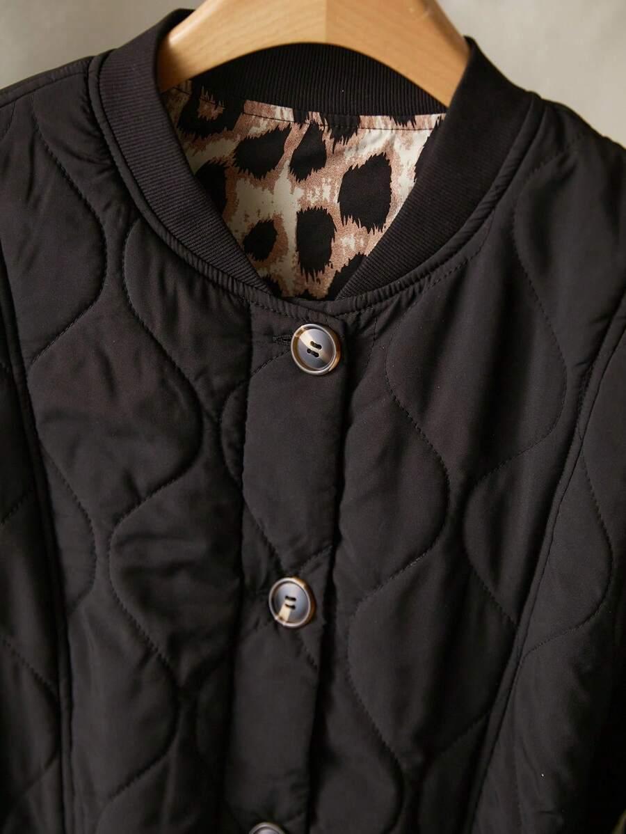 pikowana czarna kurtka animal print guziki