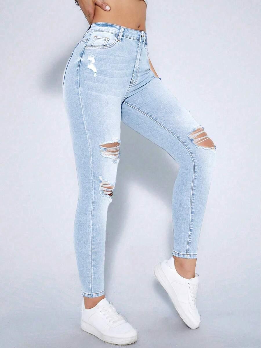 niebieskie spodnie jeans przetarcia